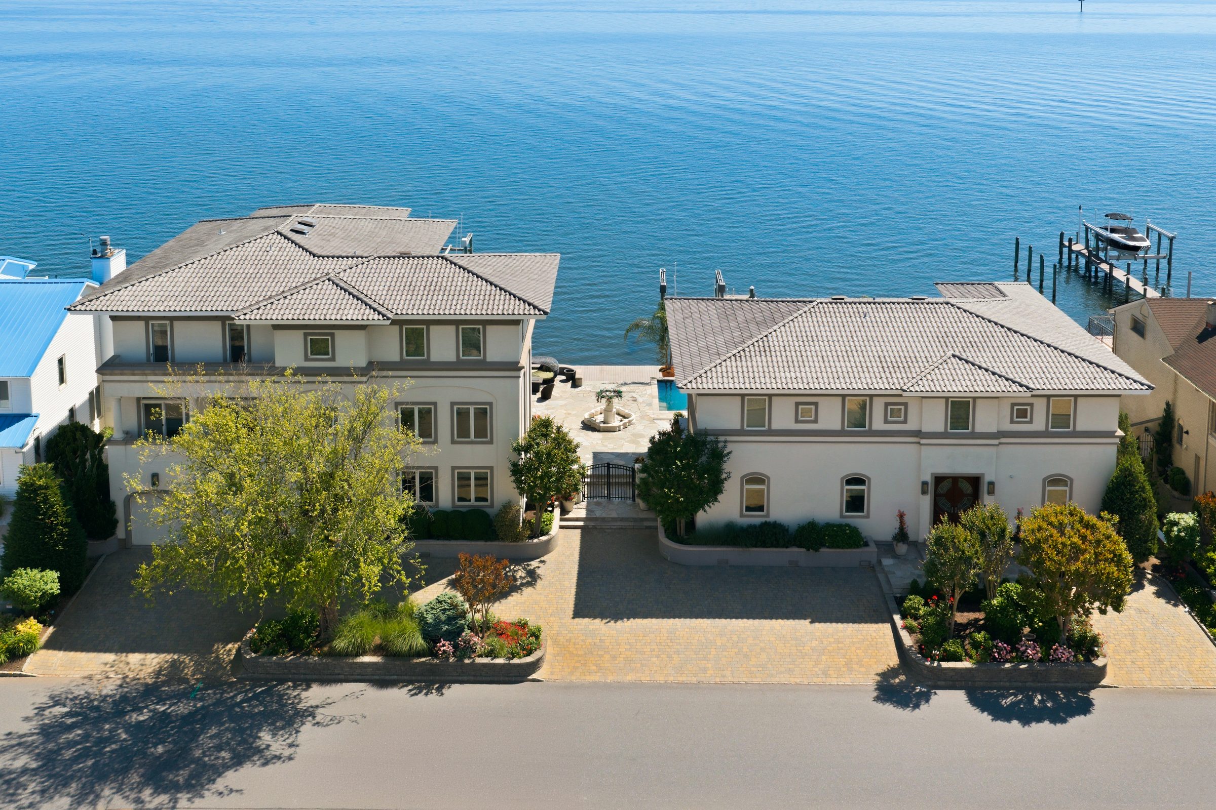 3331-3333 Long Point Drive, Toms River, NJ 08753 — aerial daytime view of the waterfront main residence and guest house at 3331-3333 Long Point Drive on Barnegat Bay