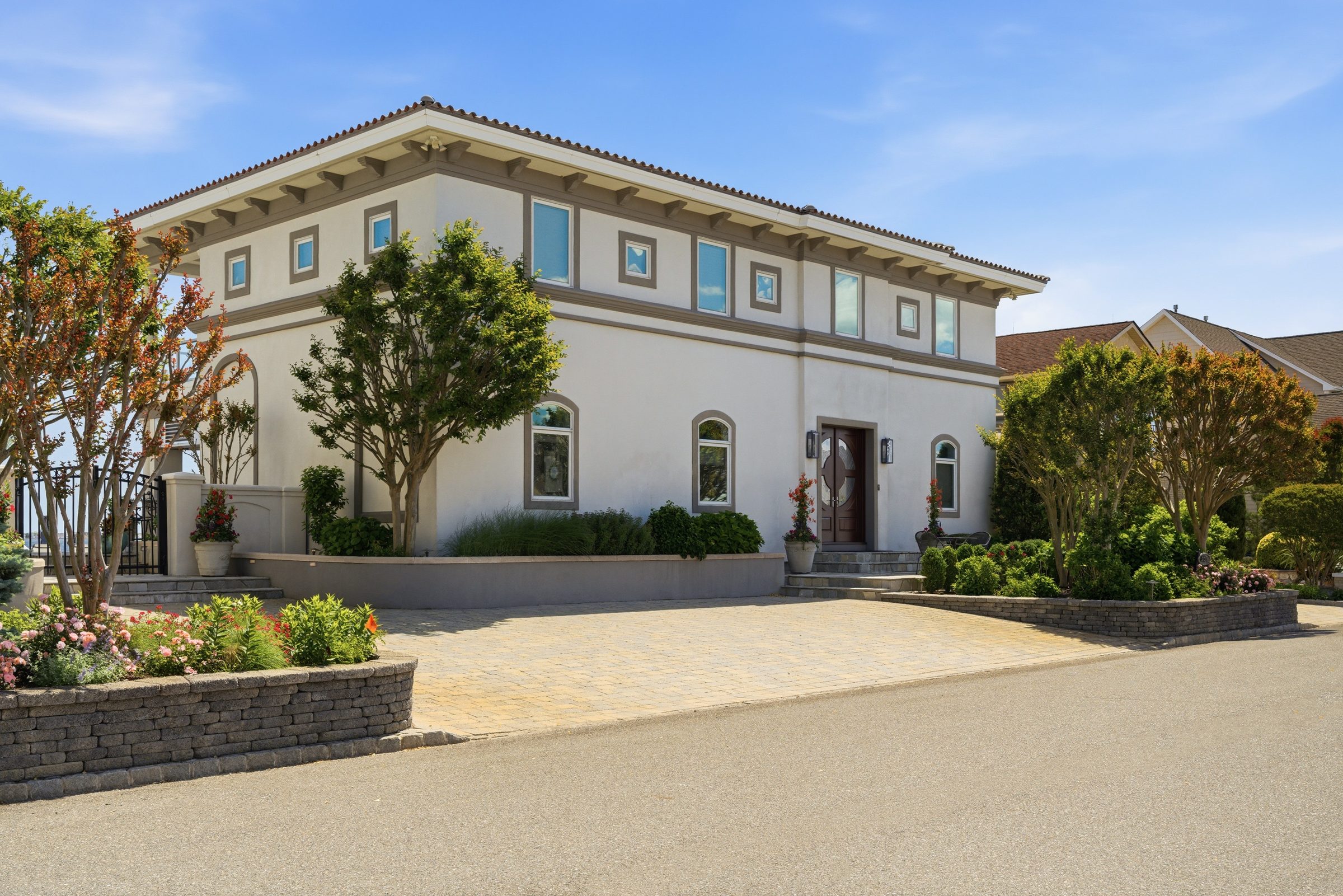 guest house facade with a circular entry door