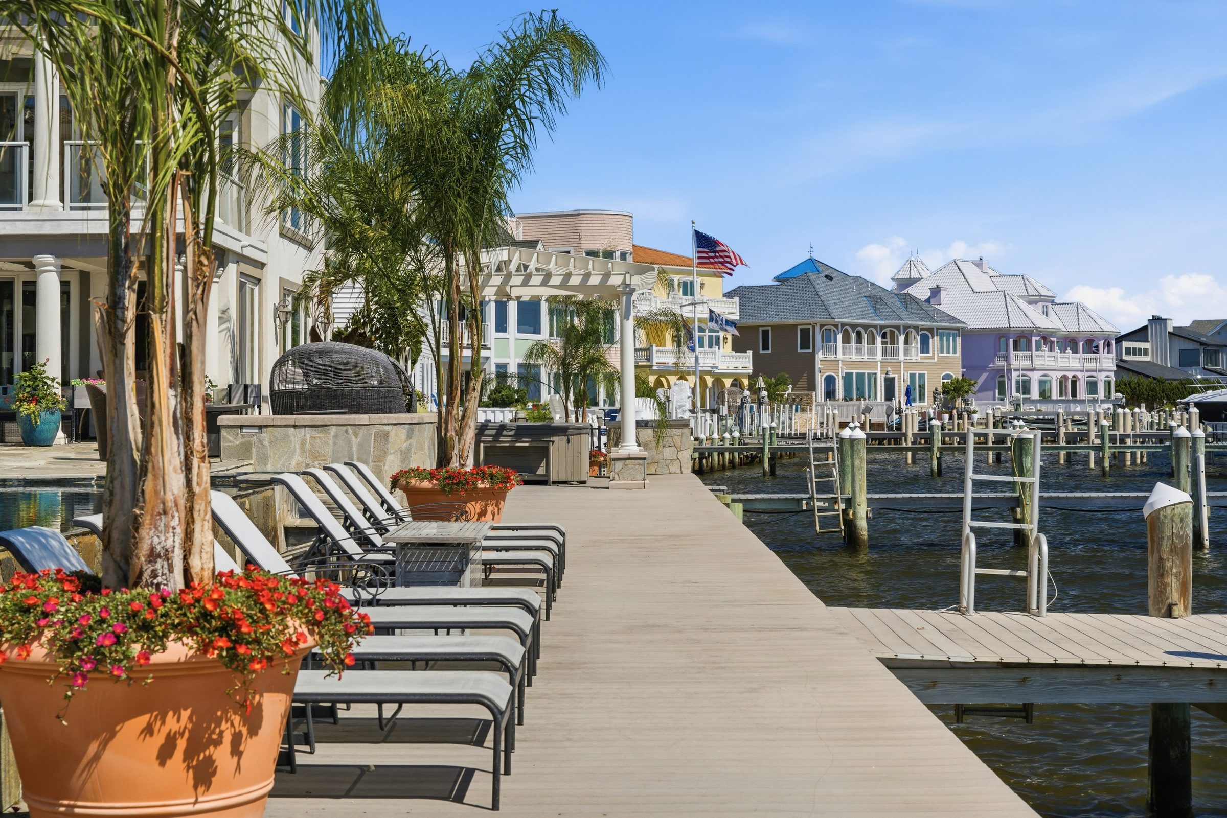 waterfront patio seating area beside the estate