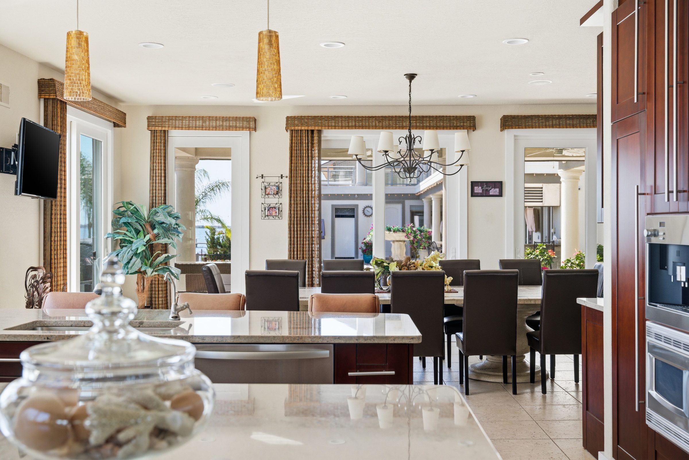gourmet kitchen with center island and waterfront views